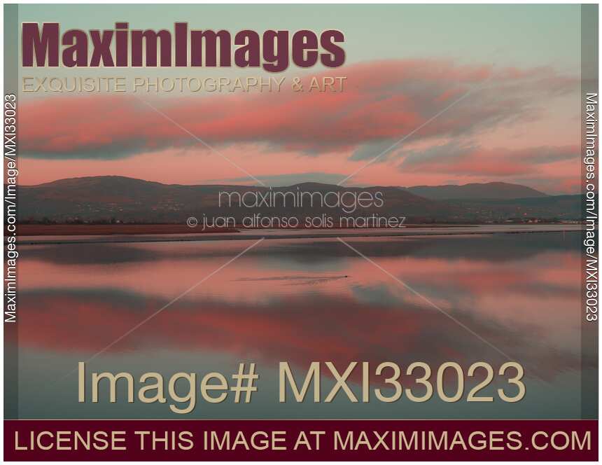 Red skies over Dundalk Bay at twilight tranquil nature scenery in Ireland