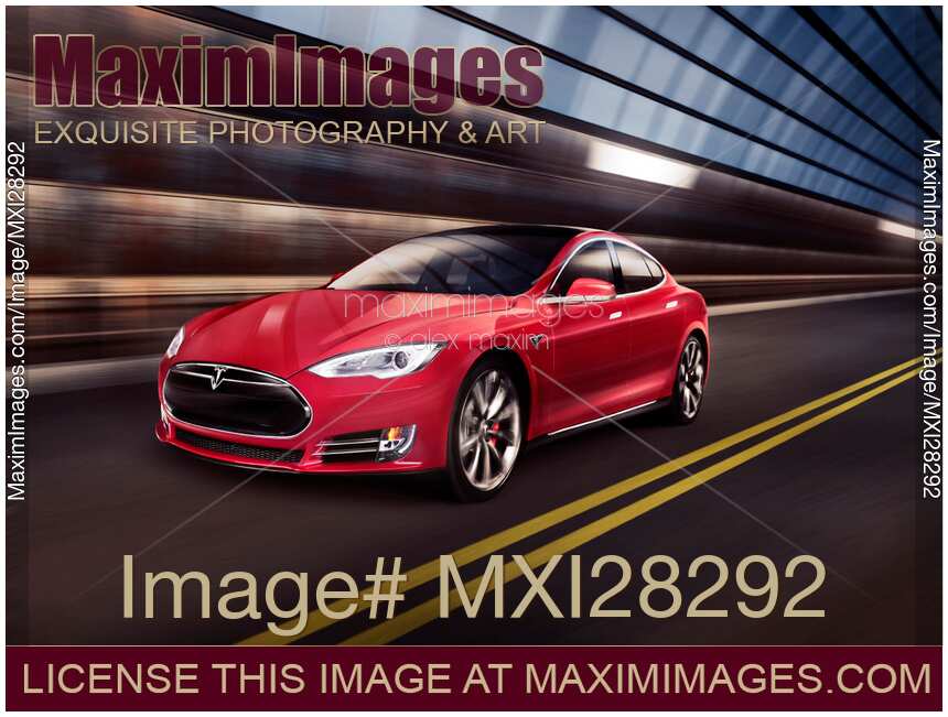 Red Tesla Model S red luxury electric car speeding in a tunnel