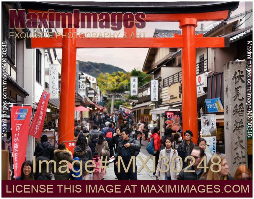 Red Torii gate at the exit of Fushimi Inari shrine in Kyoto