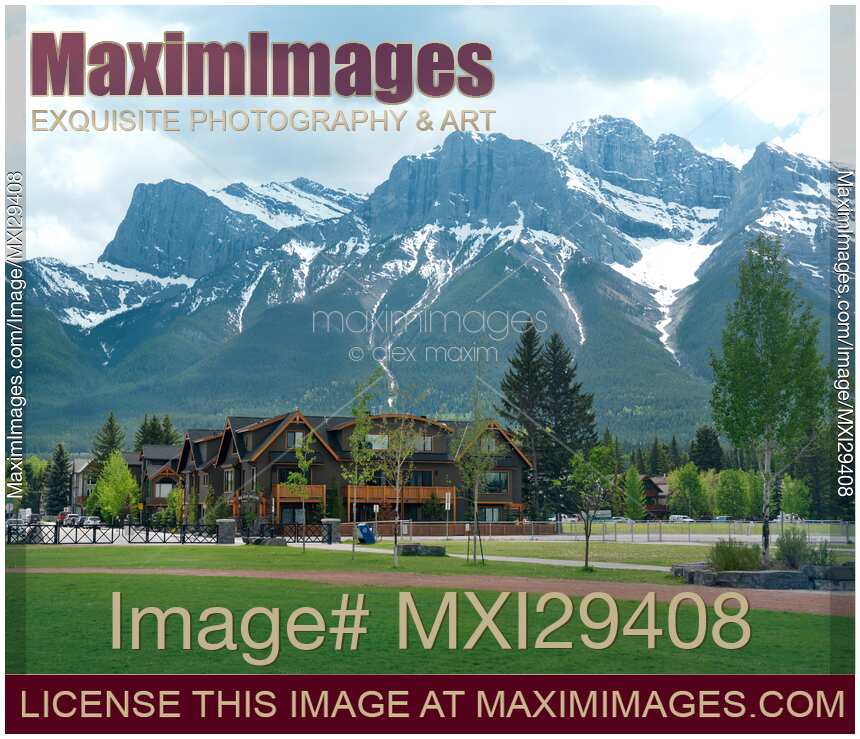 Residential houses in Canmore Alberta with Rocky Mountains nature scenery