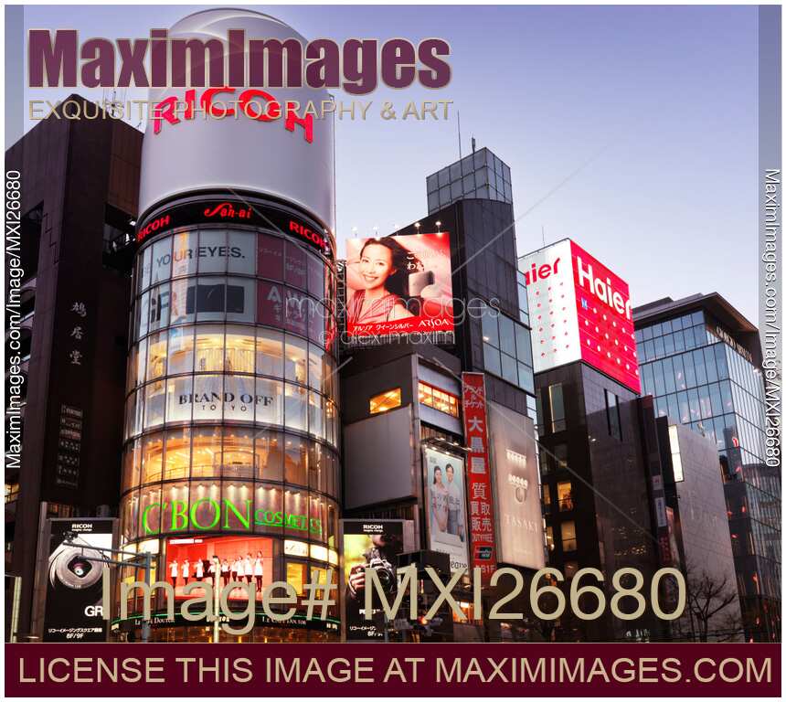 Ricoh building and colorful signs in Ginza