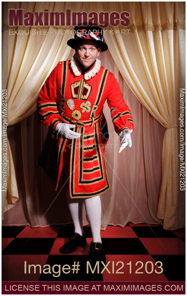 Royal bodyguard Beefeater bowing in welcoming gesture