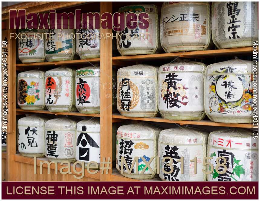Sake barrels Kazaridaru at the entrance gate of Heian Shinto shrine in Kyoto