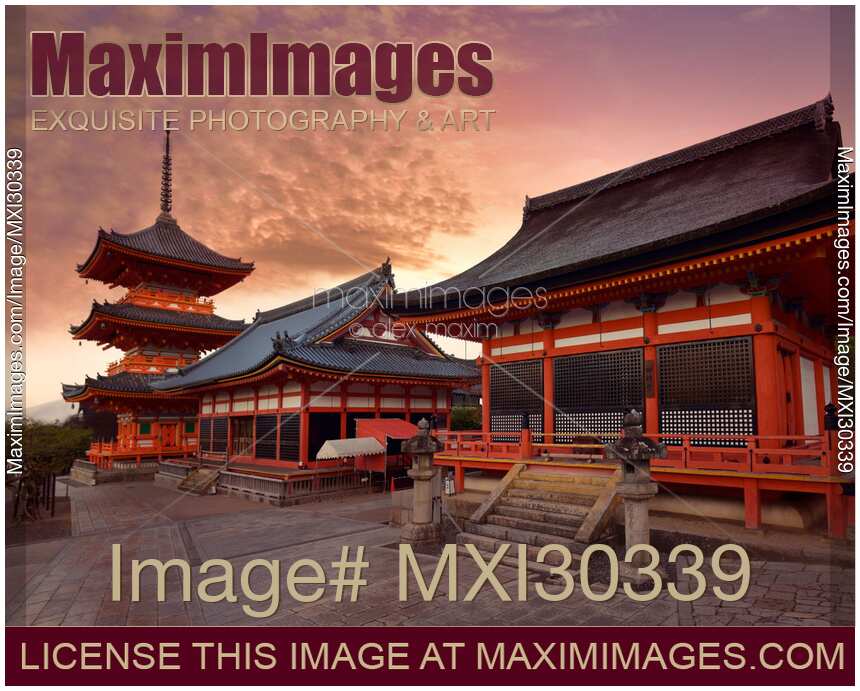 Sanjunoto pagoda Kaisan-do and Kyo-do hall at Kiyomizu-dera Buddhist temple Kyoto in dramatic red sunrise