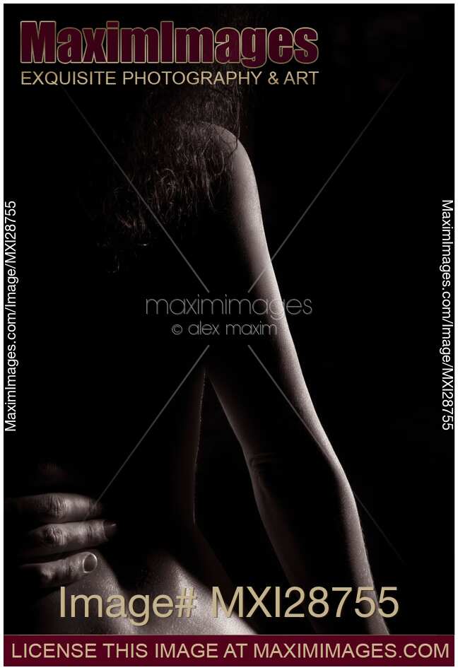 Sensual abstract photo of nude woman back with man hand