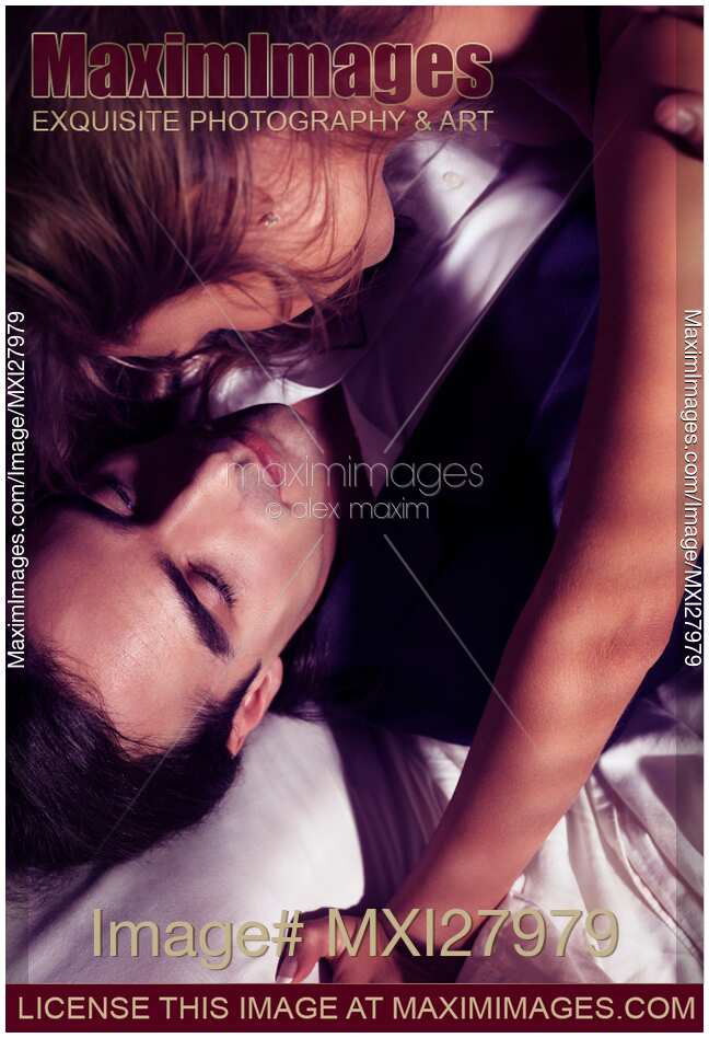 Sensual artistic portrait of a couple about to kiss