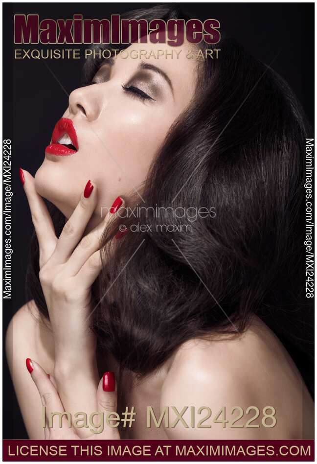 Sensual beauty portrait of a woman with red lipstick