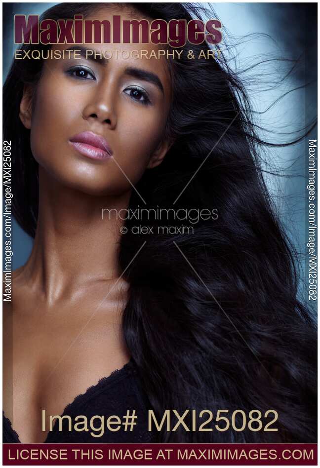 Sensual beauty portrait of a young woman with long hair