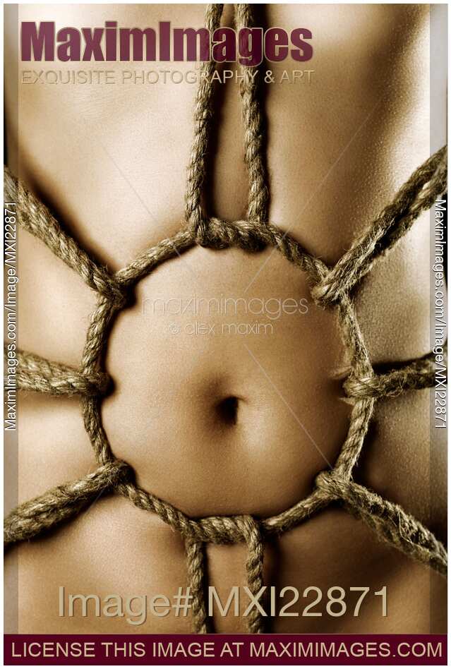 Sensual Bondage ropes on sexy nude woman body