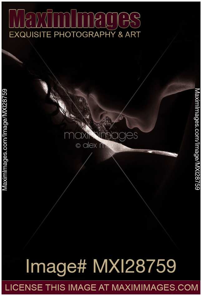 Sensual closeup of woman face kissing man nude body