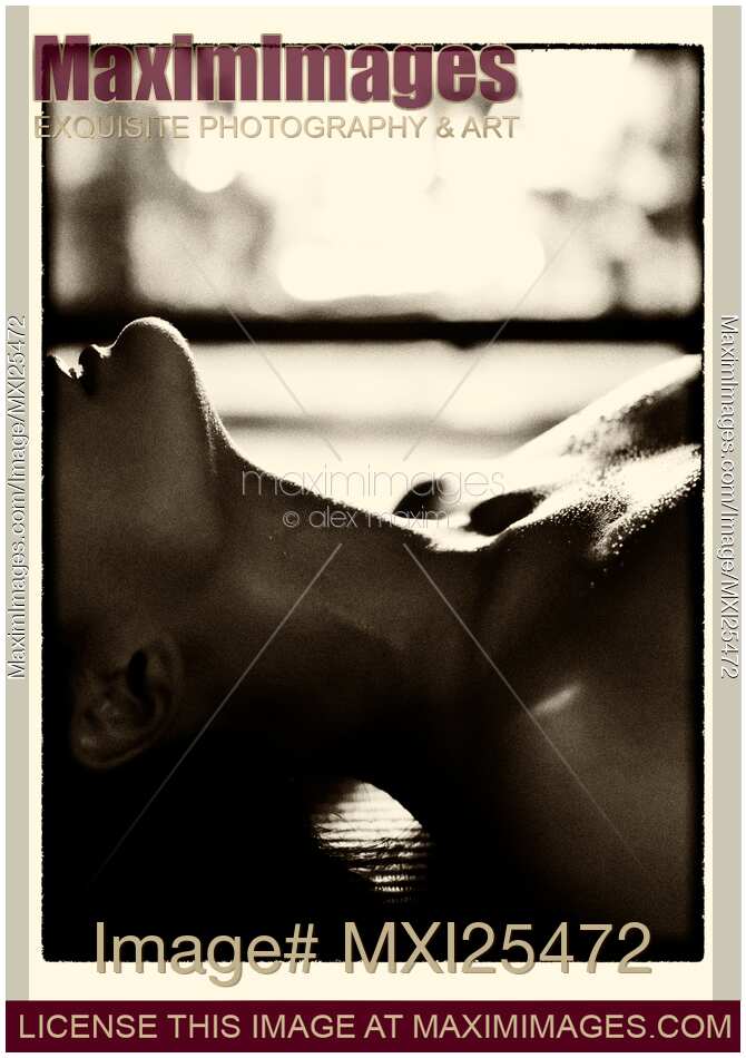 Sensual closeup of young woman making love in front of fireplace