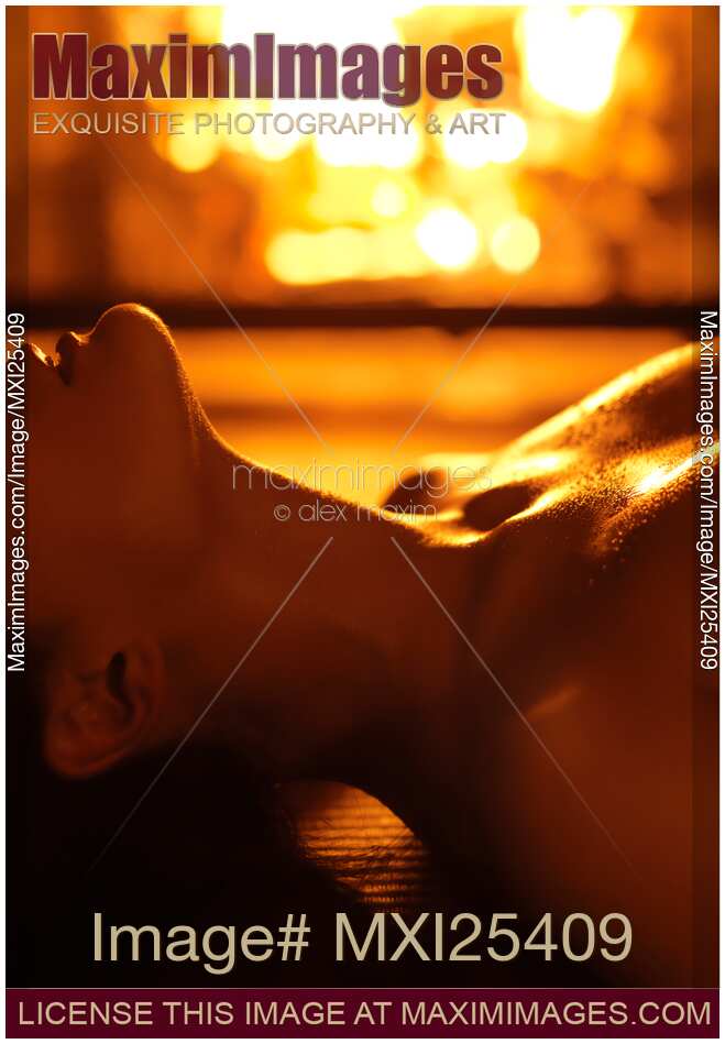 Sensual photo of Naked Woman in Front of Fireplace