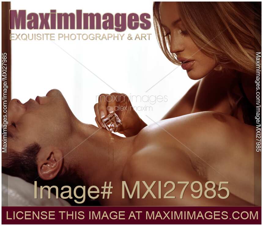 Sensual portrait of a couple playing with ice