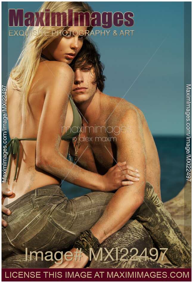 Sensual Portrait of a Young Couple on the Beach