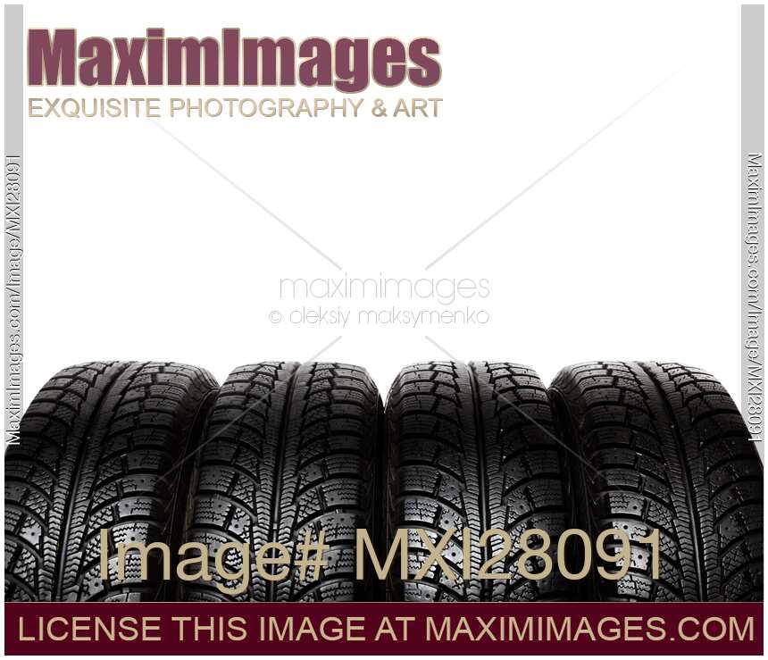 Set of snow tires isolated on white