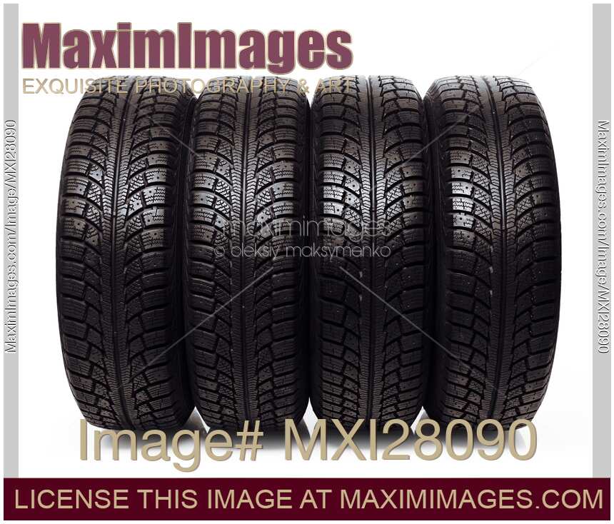Set of winter snow tires isolated on white