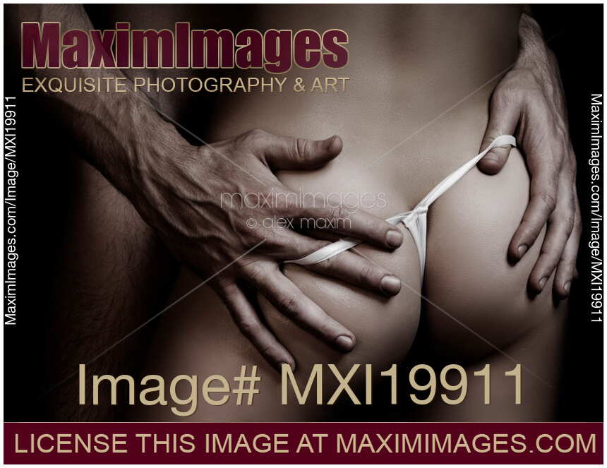 Sexy Couple Closeup of Bodies Man hands of woman's buttocks.