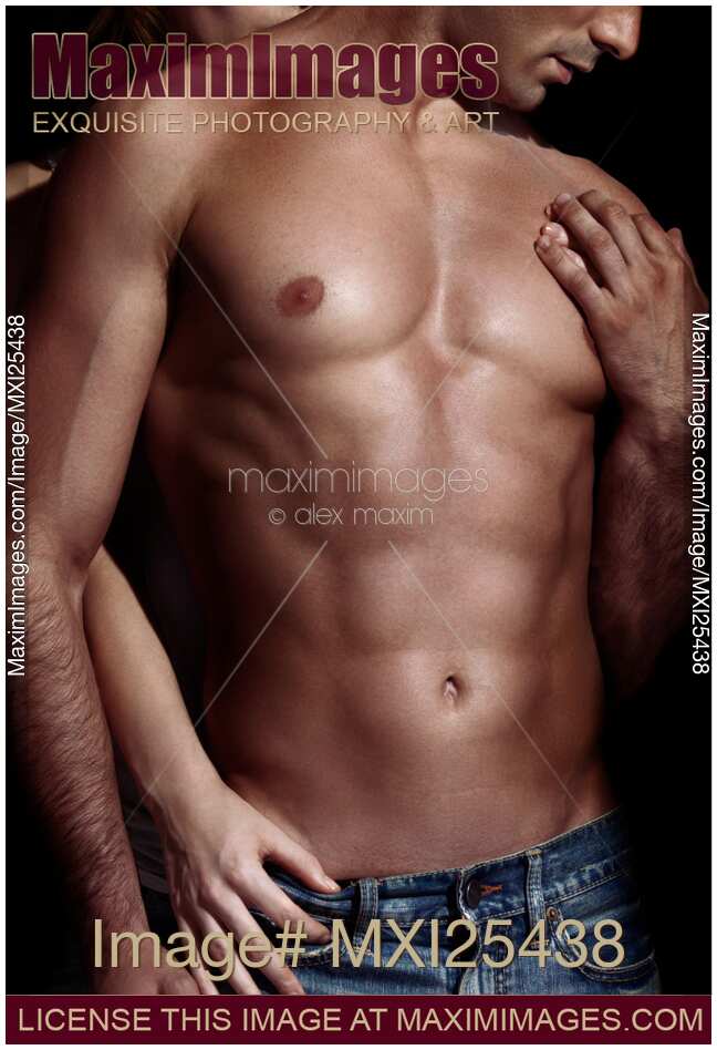 Sexy couple Woman behind man with sexy muscular bare torso