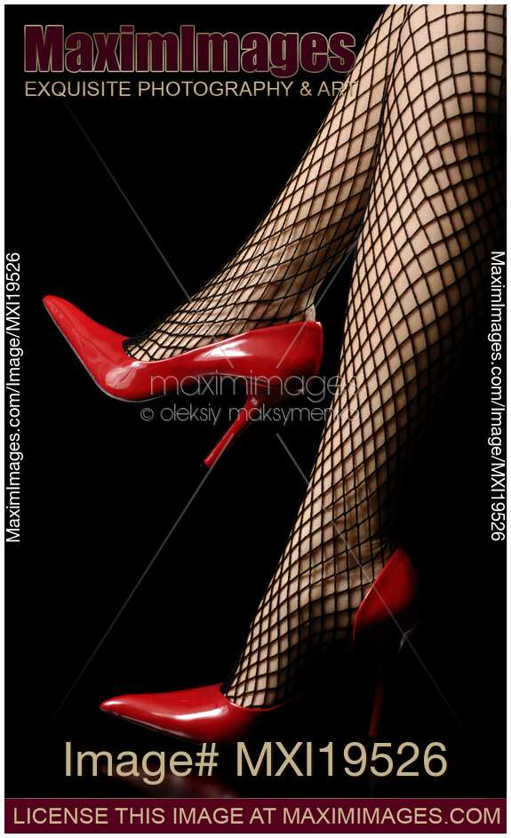 Sexy legs red high heel shoes and fishnets