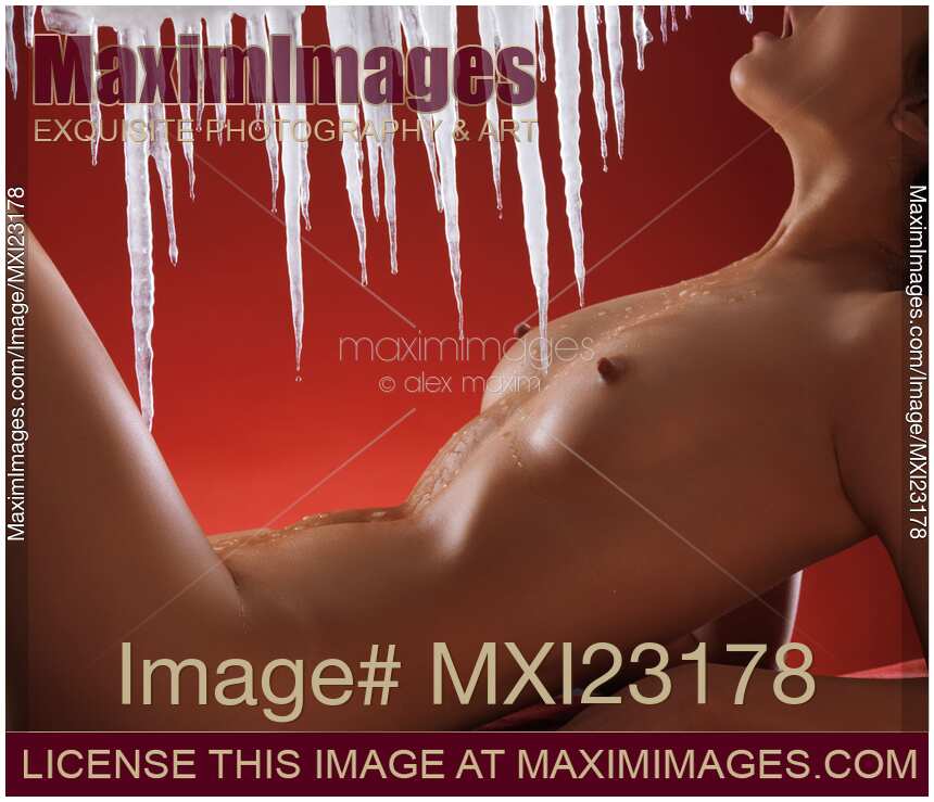 Sexy Naked Woman Under Melting Icicles