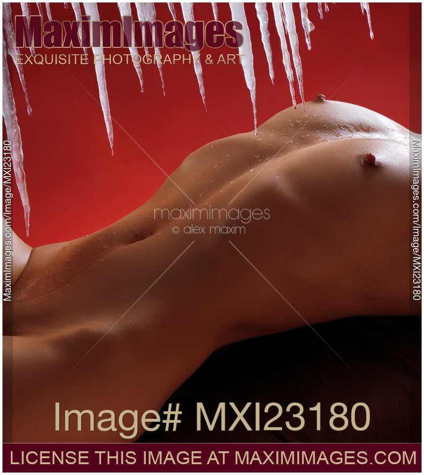 Sexy Naked Woman Under Melting Icicles