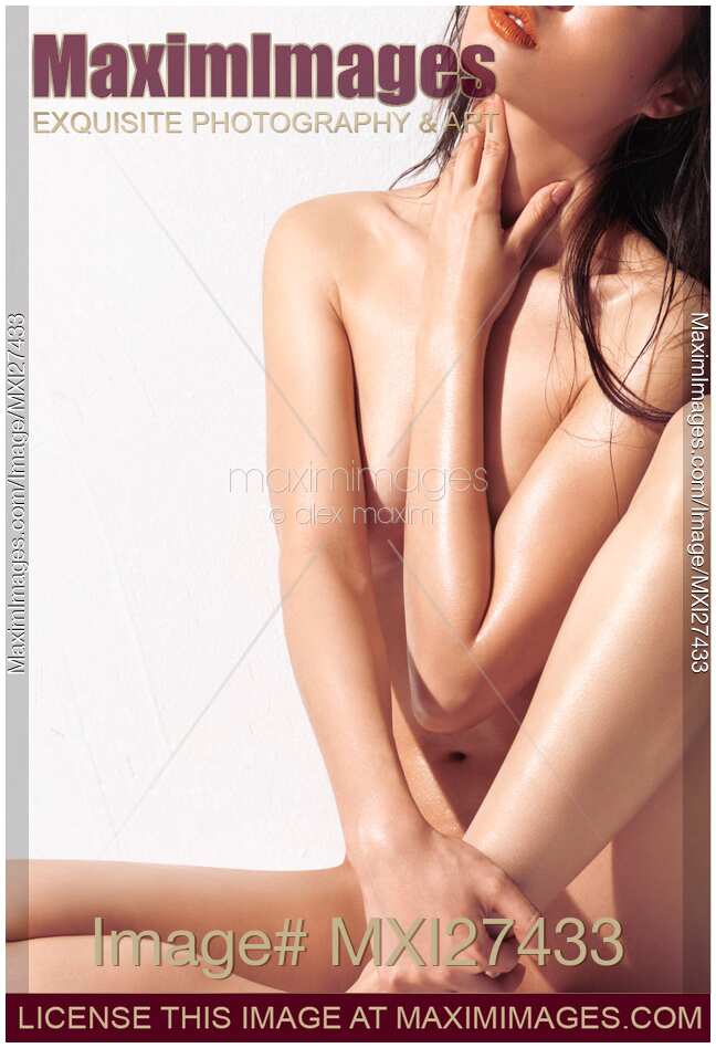 Sexy nude asian woman with shiny skin