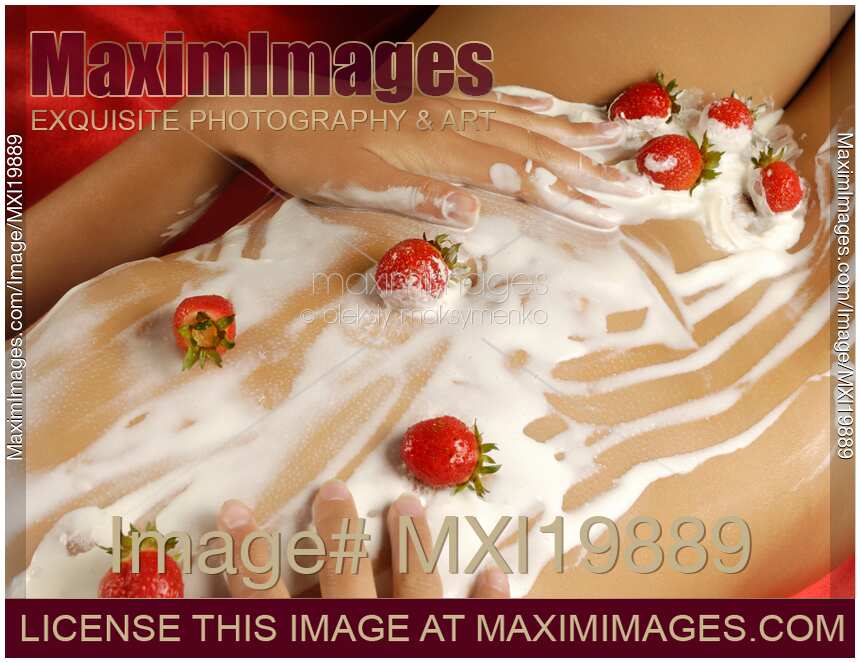 Sexy Nude Woman Body Covered with Cream and Strawberries