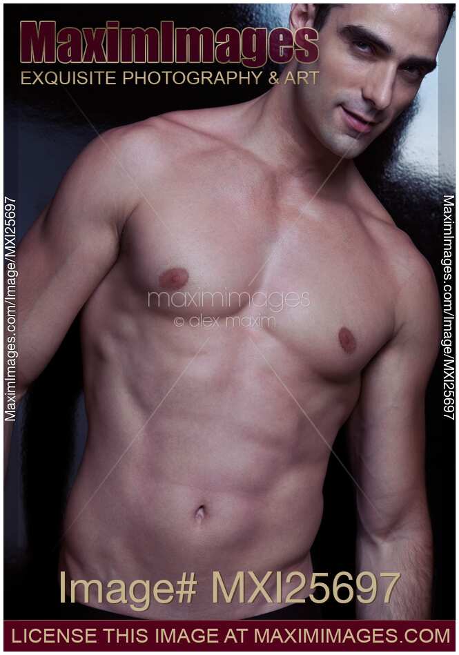 Sexy smiling young man with bare torso