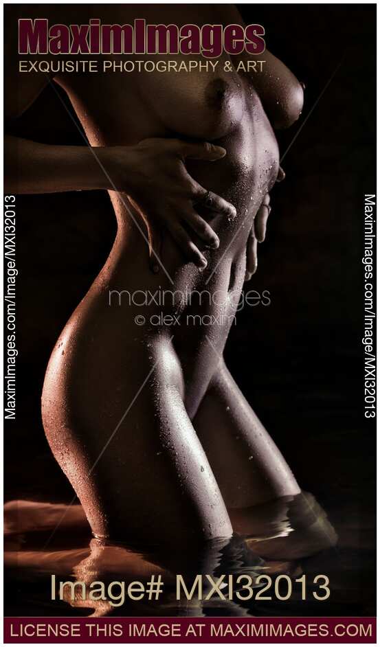 Sexy wet nude woman body with hands on her dark shiny metallic skin standing in water