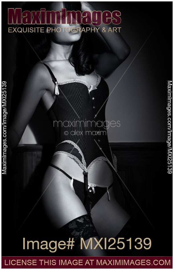 Sexy woman wearing lingerie and stockings Black and white