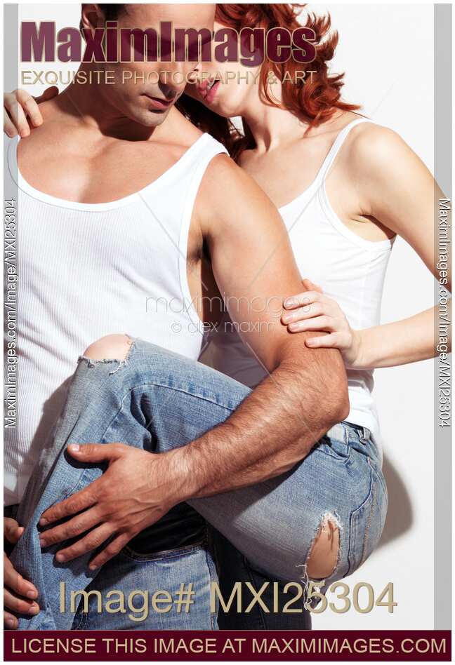 Sexy young couple in jeans