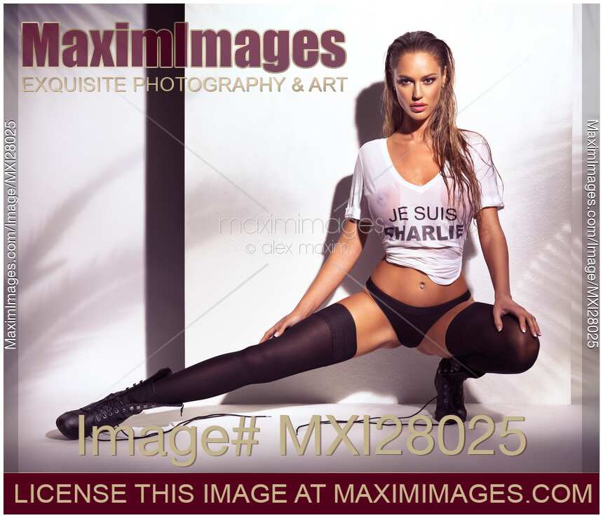 Sexy young woman in wet Je Suis Charlie shirt and underwear Charlie Riina