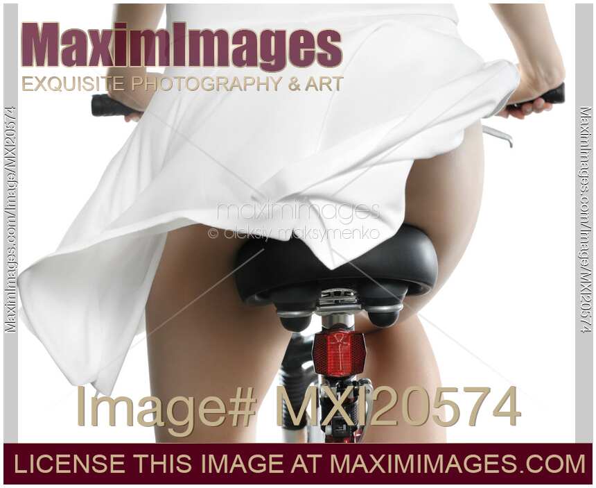 Sexy Young Woman on a Bicycle