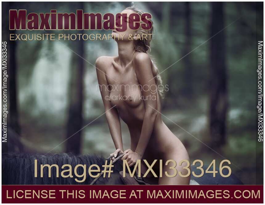 Sexy young woman riding a horse naked. Romantic fine art nude portrait.