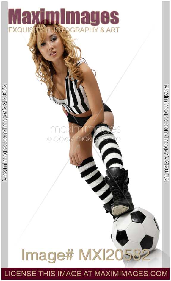 Sexy Young Woman with a Soccer Ball