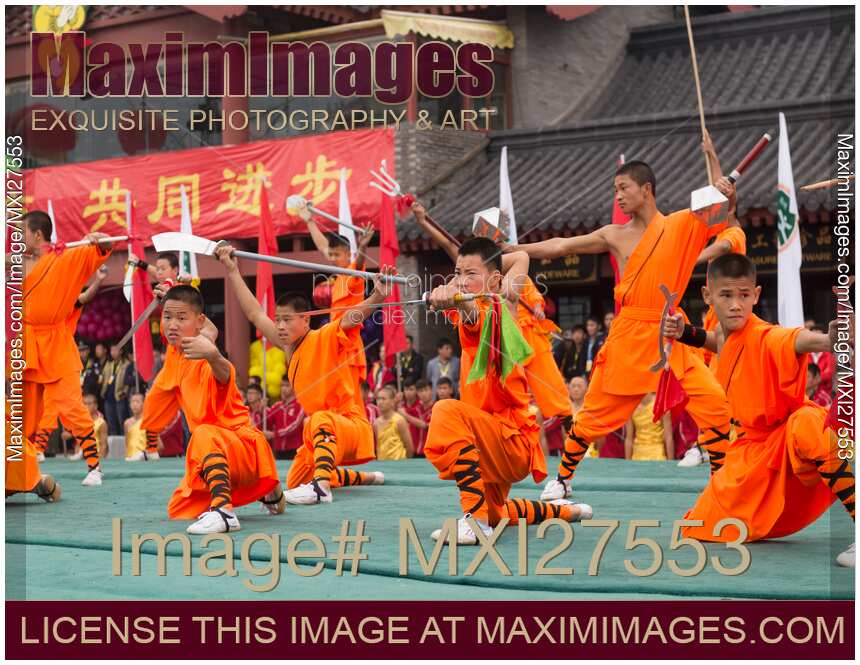 Shaolin Kung Fu student performing with weapons