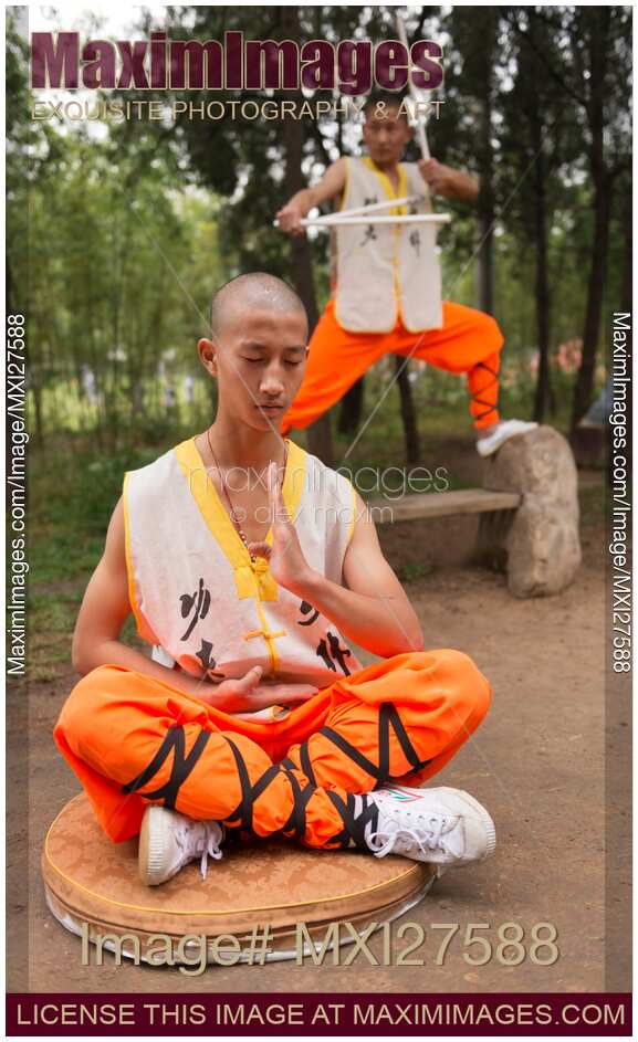 Shaolin martial arts school student meditating outside