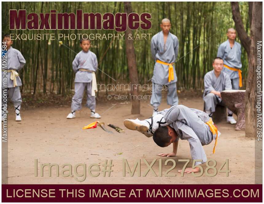 Photo of Shaolin martial arts school student showing his flexibility