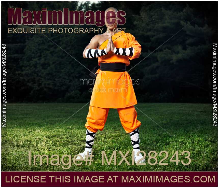 Shaolin warrior monk with hands in lotus position