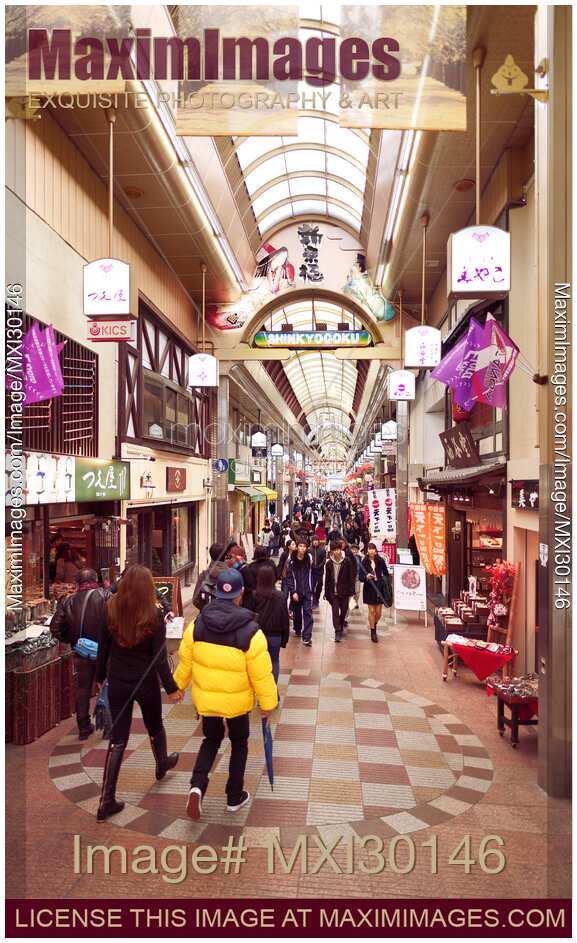 Shinkyogoku covered street shopping arcade busy with people Kyoto Japan