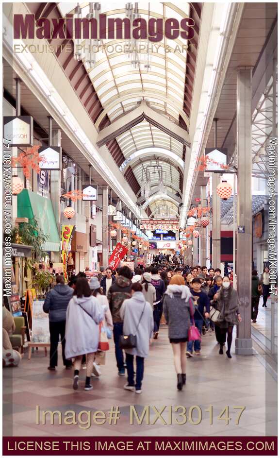 Shinkyogoku covered street shopping mall busy with people Kyoto Japan