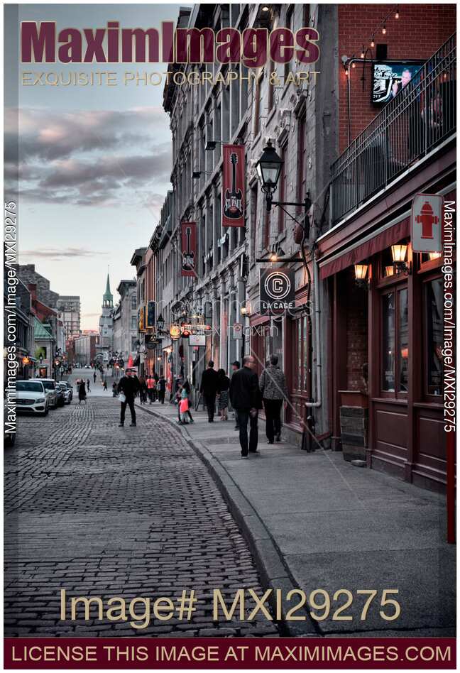 Shops and restaurants on historic street of old town street Rue Saint Paul in Montreal