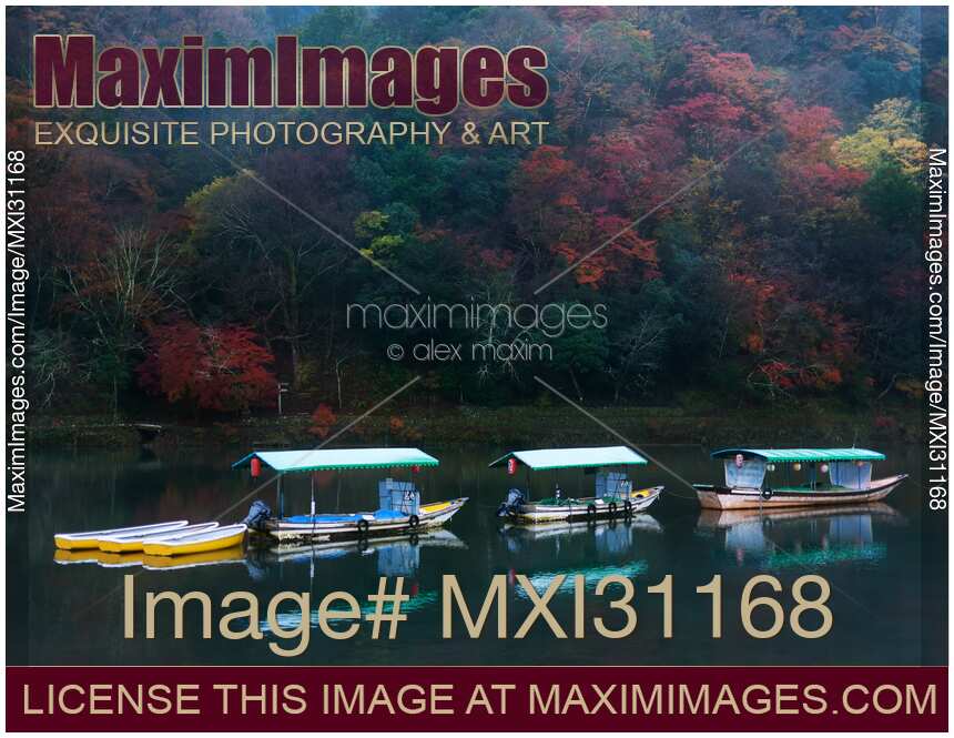 Sightseeing pleasure cruise boats on Katsura River Arashiyama Kyoto