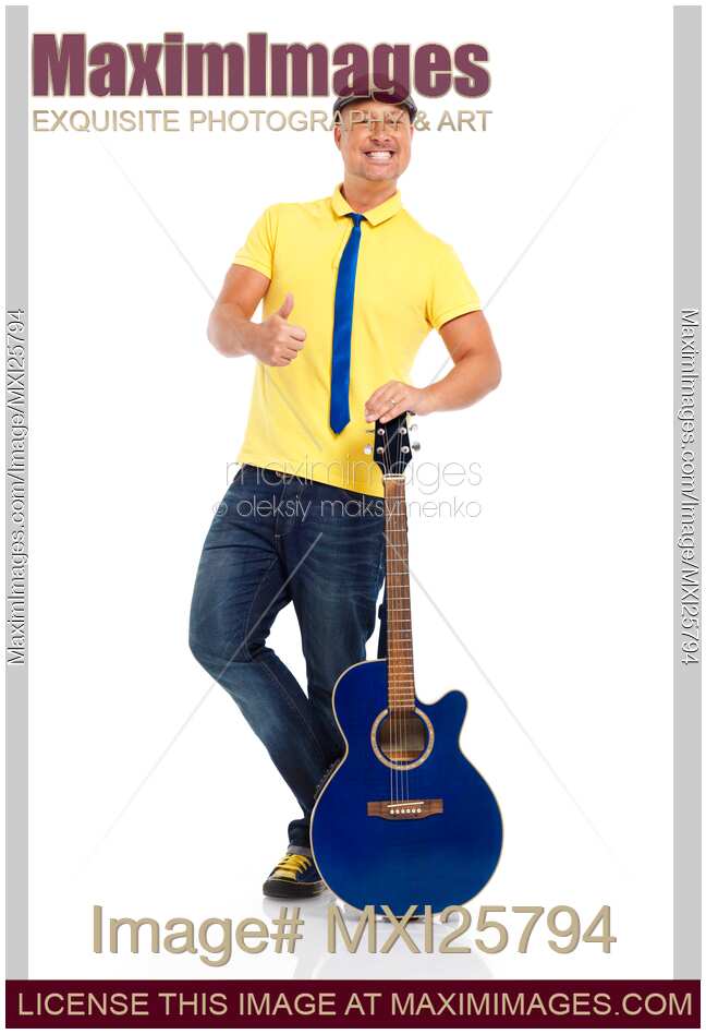 Smiling man with a guitar showing thumbs up