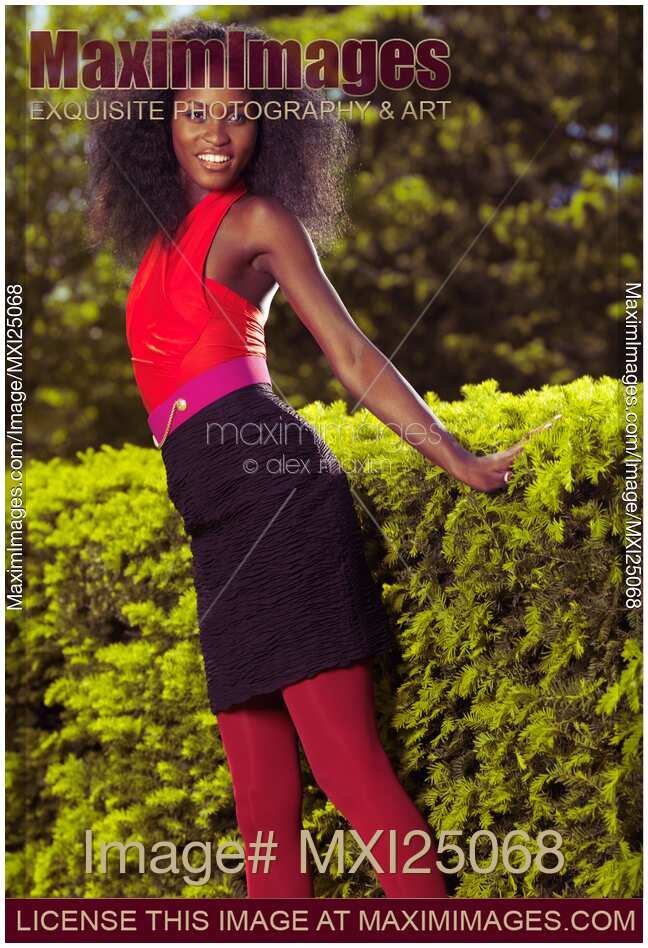 Smiling Young African American Woman in a park