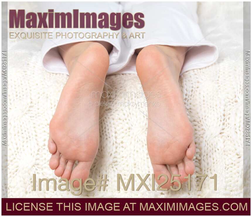 Soles of bare feet of a woman