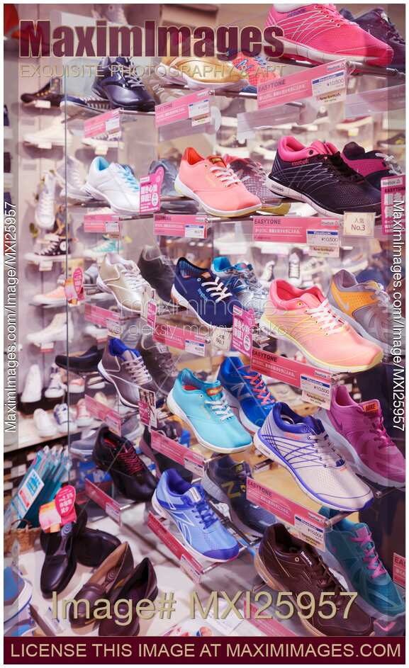 Photo of Sports shoes in store Stock Image MXI25957