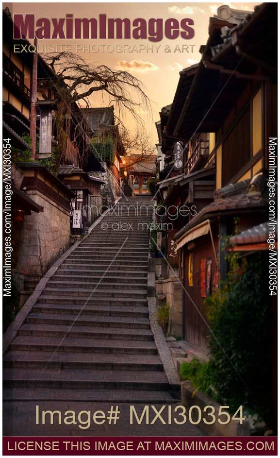 Stairs at Yasaka dori historic street in Kyoto empty and quiet in early morning colorful autumn sunrise