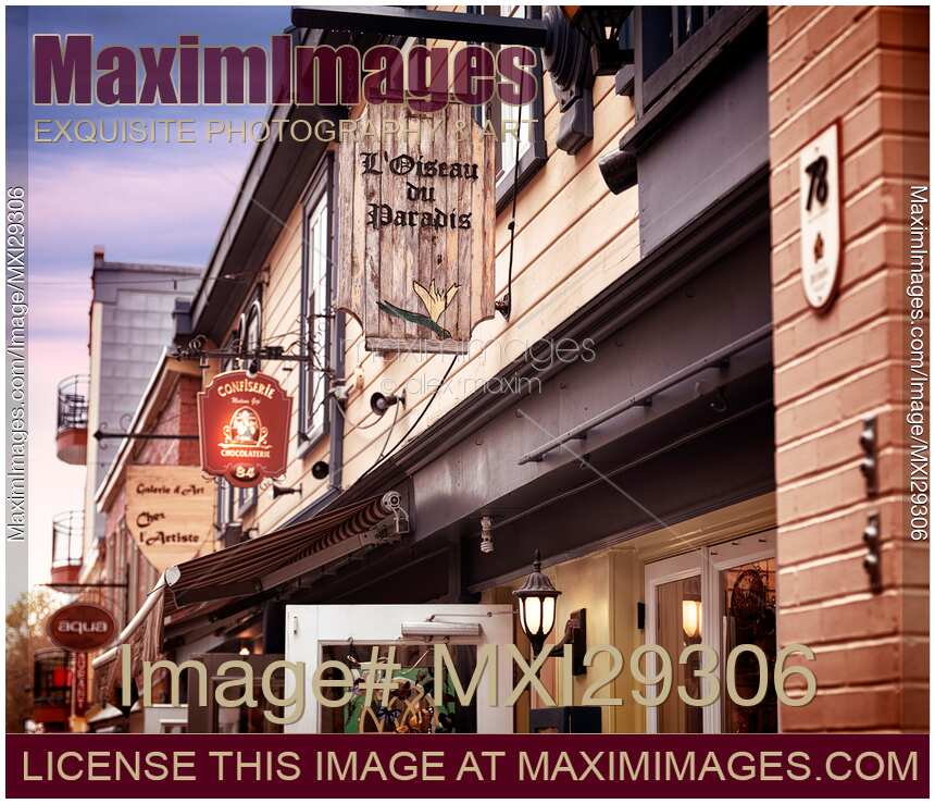 Store signs at Petit Champlain historic street in old Quebec City Canada