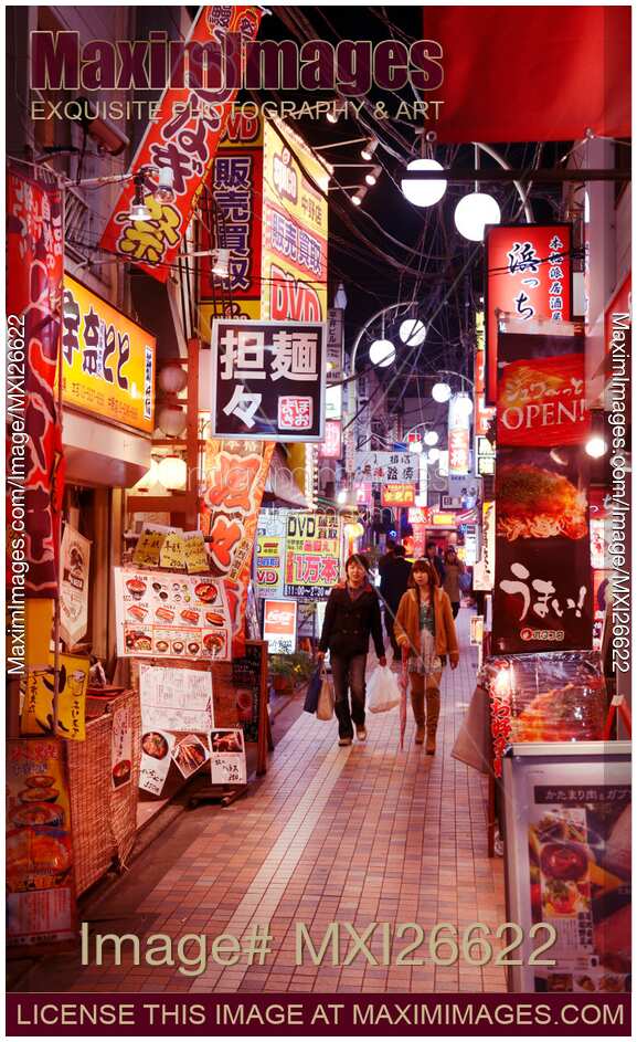 Street with restaurants in Japan at night